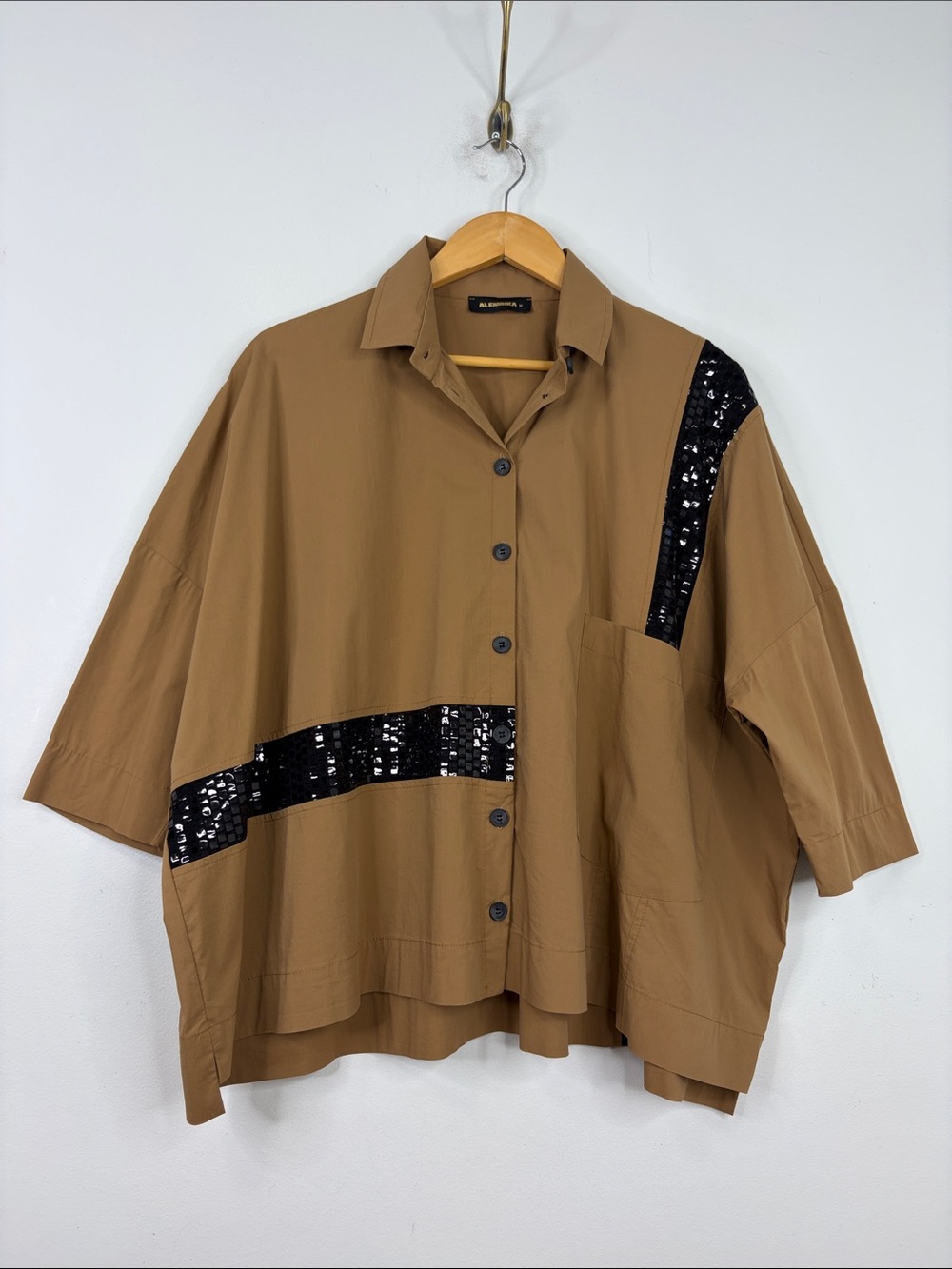 Alembika dark tan oversized shirt with 2 black sequin wide stripes.